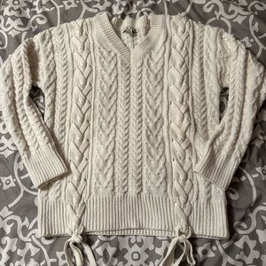 White cable-knit braid sweater